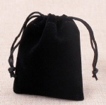 Black velvet bag with pull strings